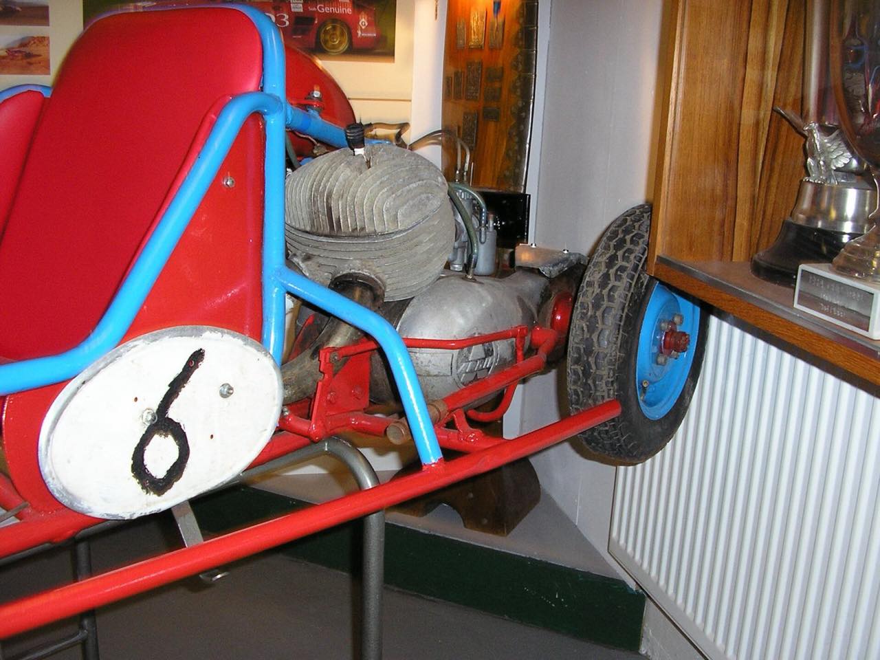 A tube-frame kart from behind